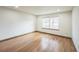 Bedroom featuring hardwood floors, recessed lighting and bright window at 10729 Kipling Way, Broomfield, CO 80021