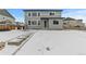 Two story home with backyard, partially covered in snow at 11633 Norfolk St, Commerce City, CO 80022