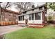 Backyard featuring a detached garage and an artificial lawn at 925 N Emerson St, Denver, CO 80218