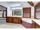 Bathroom with dual sinks and dark wooden cabinets at 925 N Emerson St, Denver, CO 80218