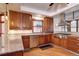 Cozy kitchen with stainless steel appliances, wood cabinets and plenty of counter space at 925 N Emerson St, Denver, CO 80218