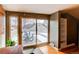 Bright sliding doors bring natural light into the interior with seating and views from the balcony at 2838 Forest St, Denver, CO 80207