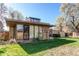 Back exterior of home featuring a wall of windows at 2838 Forest St, Denver, CO 80207