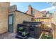 Backyard featuring an outdoor hot tub with a brick privacy wall at 2838 Forest St, Denver, CO 80207