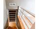 Bright staircase and custom built-in shelving add architectural charm to this home's living space at 2838 Forest St, Denver, CO 80207