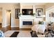 Elegant living room featuring a modern fireplace, neutral paint colors, and stylish decor at 12371 Red Fox Way, Broomfield, CO 80021