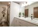 Bathroom featuring a modern shower, sleek fixtures, and contemporary design for a spa-like experience at 10652 W Florida Ave # D, Lakewood, CO 80232