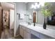 Well-lit bathroom features a modern vanity, stylish fixtures, and a clean, contemporary design at 10652 W Florida Ave # D, Lakewood, CO 80232