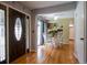 An inviting dining area featuring hardwood floors, a round table, and ample natural light at 10652 W Florida Ave # D, Lakewood, CO 80232