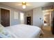 Bright bedroom with ceiling fan, ensuite bathroom and large closet space at 10652 W Florida Ave # D, Lakewood, CO 80232