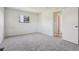 Bedroom with carpeted floor, and neutral wall color at 4710 E Louisiana Ave, Denver, CO 80246