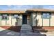 Inviting home entrance with visible house number, and well-maintained front yard landscaping at 4710 E Louisiana Ave, Denver, CO 80246