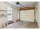 Spacious garage featuring an open door to the kitchen for easy access at 4710 E Louisiana Ave, Denver, CO 80246