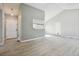 Bright living room with sleek flooring, and neutral walls at 4710 E Louisiana Ave, Denver, CO 80246