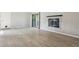 Bright living room features a fireplace and a sliding glass door to the outside at 4710 E Louisiana Ave, Denver, CO 80246