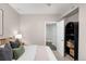 Comfortable bedroom features soft lighting, stylish decor, and an open doorway to adjacent room at 2240 N Clay St # 309, Denver, CO 80211