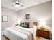 Inviting bedroom with a ceiling fan, stylish decor, and plenty of natural light at 2240 N Clay St # 309, Denver, CO 80211
