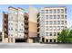 Exterior view of the building showcasing the architecture and proximity to neighborhood at 2240 N Clay St # 309, Denver, CO 80211