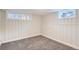 Basement bedroom featuring carpeted floors, neutral paint, and a window at 175 S Emerson St, Denver, CO 80209