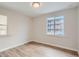Bedroom with laminate flooring and natural light from the window at 175 S Emerson St, Denver, CO 80209