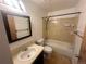 Bathroom featuring a shower-tub combo, tiled floor and vanity at 19351 E Purdue Cir, Aurora, CO 80013