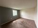 Neutral bedroom with carpeted floor and window with outdoor view at 19351 E Purdue Cir, Aurora, CO 80013