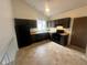 Eat-in kitchen features dark cabinets, modern appliances and a tiled floor at 19351 E Purdue Cir, Aurora, CO 80013