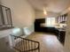 Eat-in kitchen features dark cabinets, modern appliances and a tiled floor at 19351 E Purdue Cir, Aurora, CO 80013