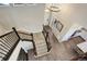 High angle view of foyer featuring the staircase, chandelier, and hardwood flooring at 23230 E Rockinghorse Pkwy, Aurora, CO 80016