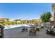 Resort style pool with a built-in spa and outdoor fireplace and grill, great for entertaining at 23230 E Rockinghorse Pkwy, Aurora, CO 80016