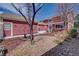 View of a the house's backyard with patio and easy access to the yard at 8641 Coors St, Arvada, CO 80005