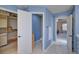Well-lit bathroom with a walk-in closet and a separate toilet room for added privacy and convenience at 8641 Coors St, Arvada, CO 80005