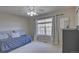 Bedroom featuring a day bed and window at 8641 Coors St, Arvada, CO 80005