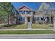 Charming two-story home with well-maintained lawn, brick facade, and black shutters for a classic curb appeal at 8641 Coors St, Arvada, CO 80005