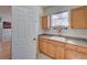 Functional laundry room with custom cabinets and countertops at 8641 Coors St, Arvada, CO 80005