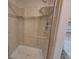 Tiled standing shower with glass door at 8641 Coors St, Arvada, CO 80005