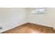 This bedroom features hardwood floors, a window, and neutral-toned walls for a serene and inviting space at 845 Everett St, Lakewood, CO 80215