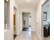 Hallway view boasting light, neutral walls and doorways that highlight the home's open and airy layout at 845 Everett St, Lakewood, CO 80215