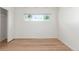 Bright room with light hardwood floors and good light from window at 1570 S Chase St, Lakewood, CO 80232