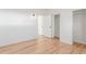 Bright room with light hardwood floors and closet at 1570 S Chase St, Lakewood, CO 80232