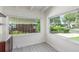 Sunny breakfast nook features bright windows and updated vinyl flooring at 1570 S Chase St, Lakewood, CO 80232