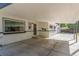 Covered parking area that offers protection from the elements and easy access to the home at 1570 S Chase St, Lakewood, CO 80232