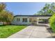 Home with covered parking, nicely landscaped and an appealing exterior at 1570 S Chase St, Lakewood, CO 80232