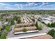 Community aerial showcasing parking, street access, and proximity to commercial areas at 13043 W 20Th Ave, Golden, CO 80401