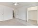Spacious bedroom with a ceiling fan, closet, and bathroom providing a relaxing retreat at 13043 W 20Th Ave, Golden, CO 80401