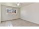 Neutral bedroom with large window and natural light offers calming and comfortable space at 13043 W 20Th Ave, Golden, CO 80401