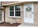 Close-up of the front entrance showcasing a white door and window at 13043 W 20Th Ave, Golden, CO 80401