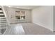 Living room with fresh paint, new carpet, lots of natural light and staircase at 13043 W 20Th Ave, Golden, CO 80401