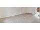 Bright, airy living room with neutral carpet flooring and fresh white trim at 13043 W 20Th Ave, Golden, CO 80401