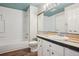 Bathroom with a shower-tub combo and tile trim at 11112 Dahlia Way, Thornton, CO 80233